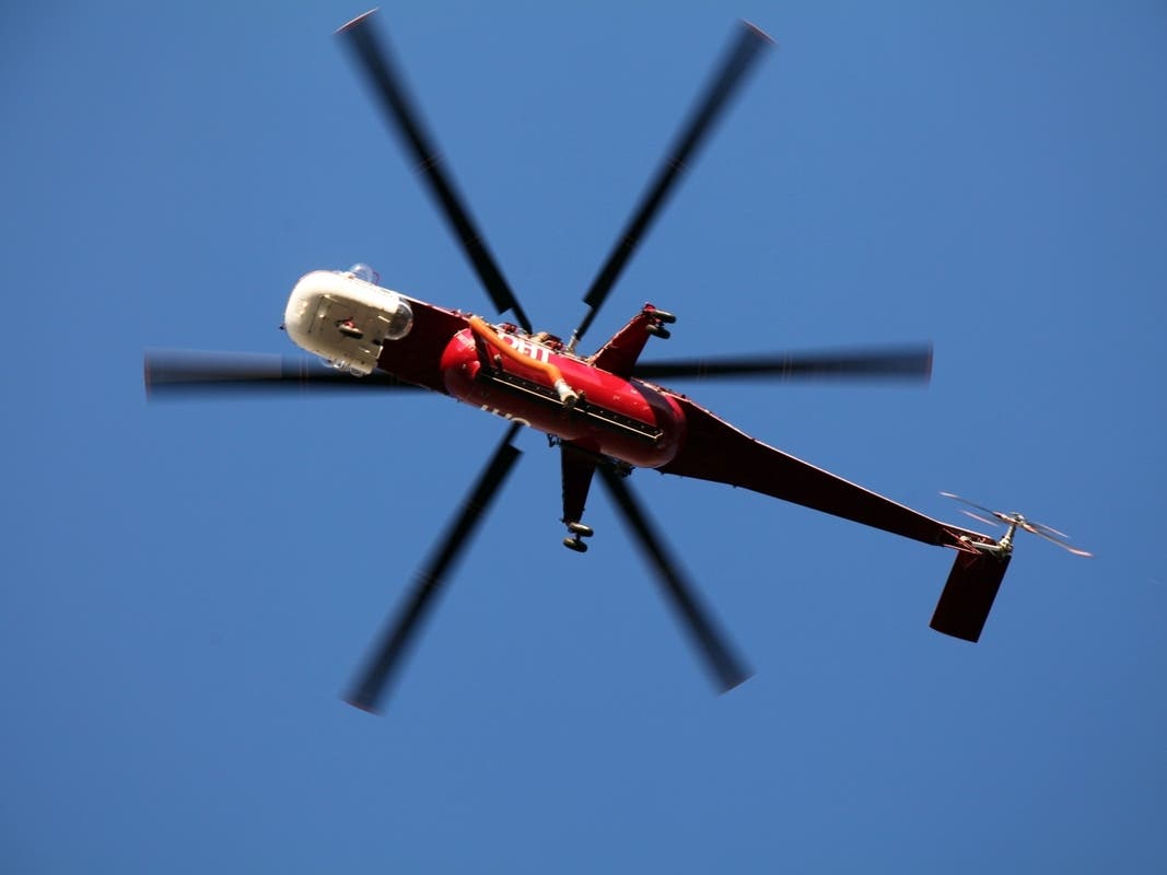Cal Fire helicopters gathered water to douse the Viper Fire, burning near Moreno Valley and Redlands Wednesday.