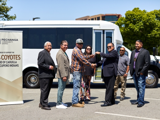 Pechanga officials hand over shuttle van keys to Tribal Council of Los Coyotes Tribe.