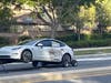 Tesla struck on the driver-side.