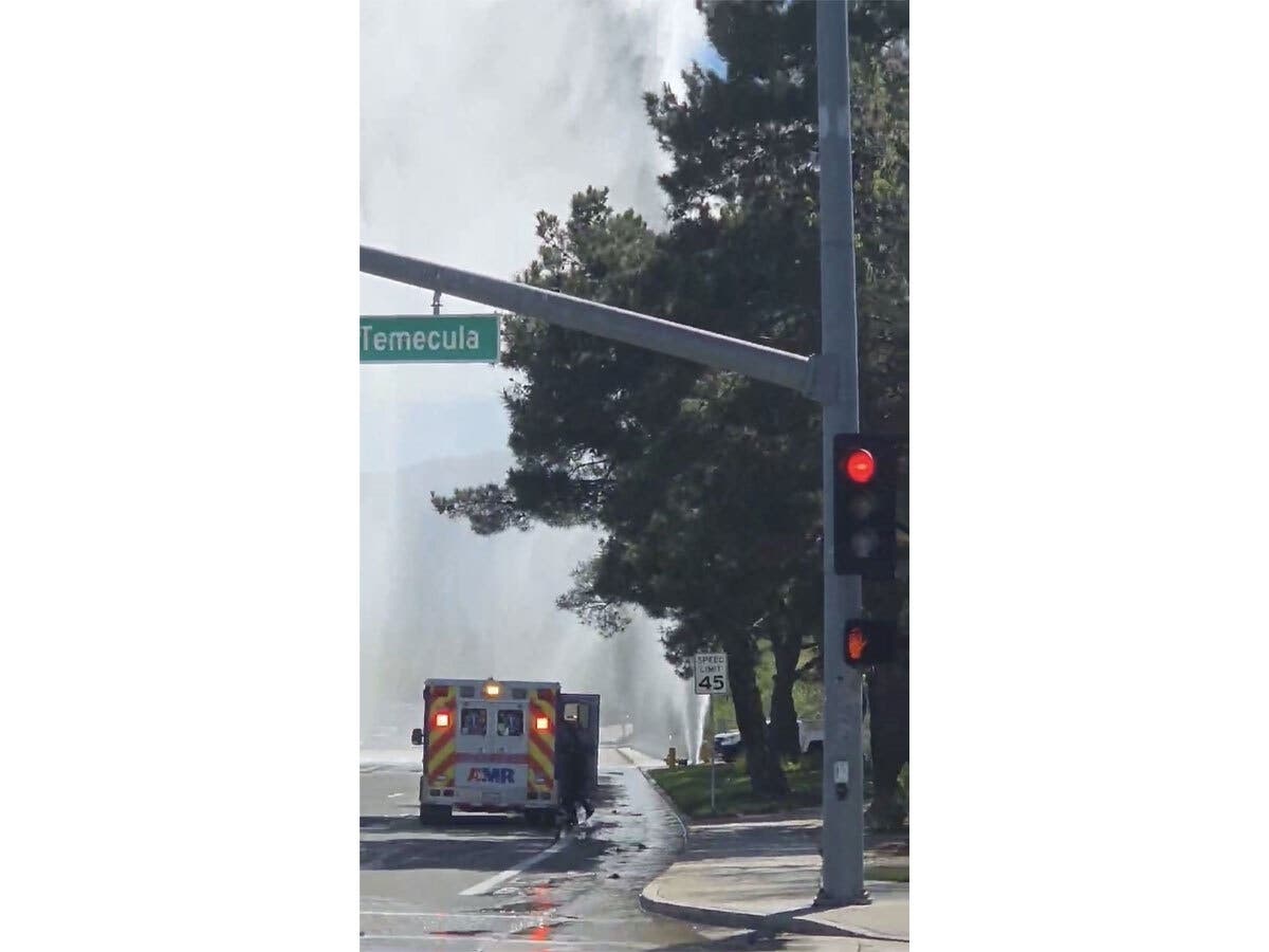 A hydrant shot water into the air off Redhawk Parkway Monday morning in Temecula