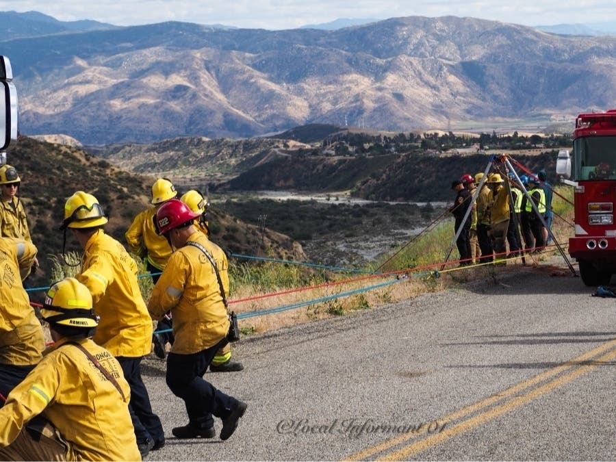 Firefighters assembled a pulley system to raise victims from the wreckage.