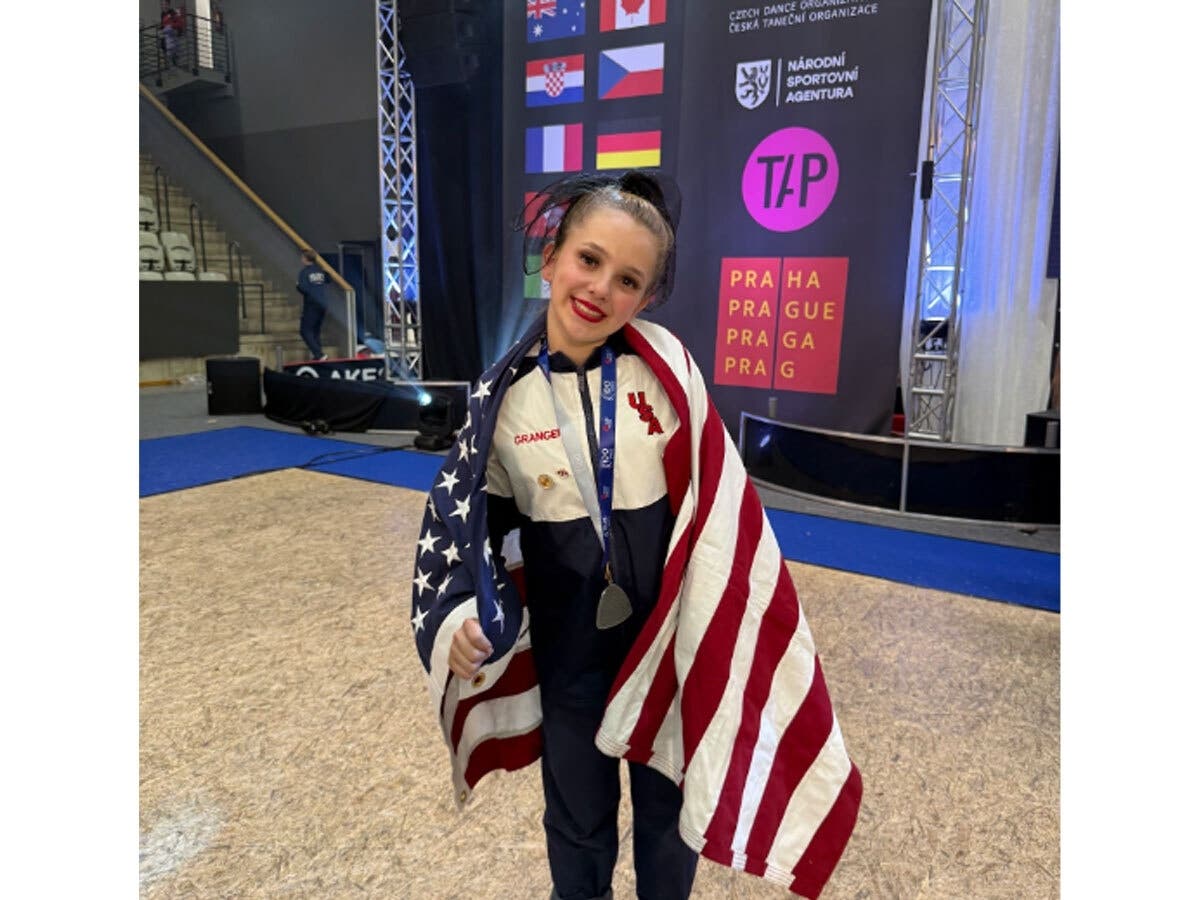 Hans Christensen Middle School (HCMS) 8th grader Harlie has achieved a remarkable feat on the global stage, representing the United States at the World Tap Dance Championships in Prague