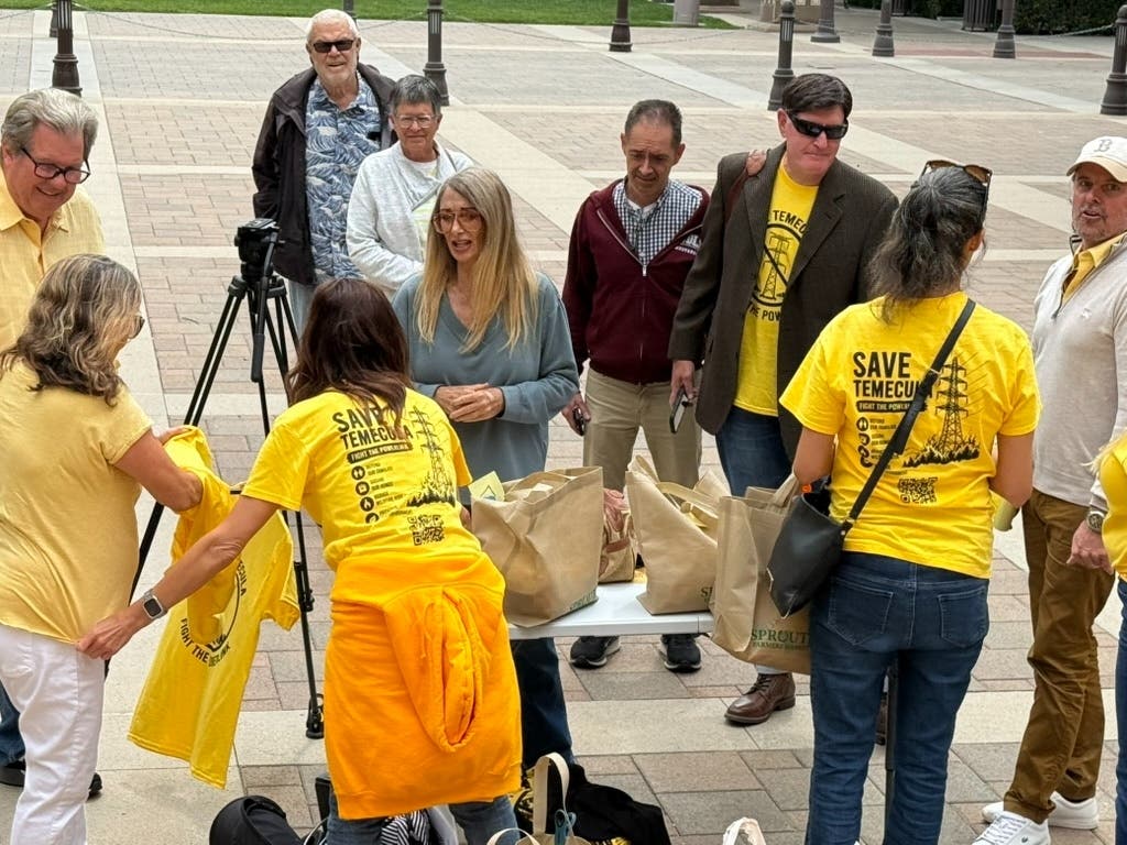 Save Temecula: Fight the Powerlines shirts bloomed across the crowd gathered to speak out against the proposed Golden Pacific Powerlink through Temecula.