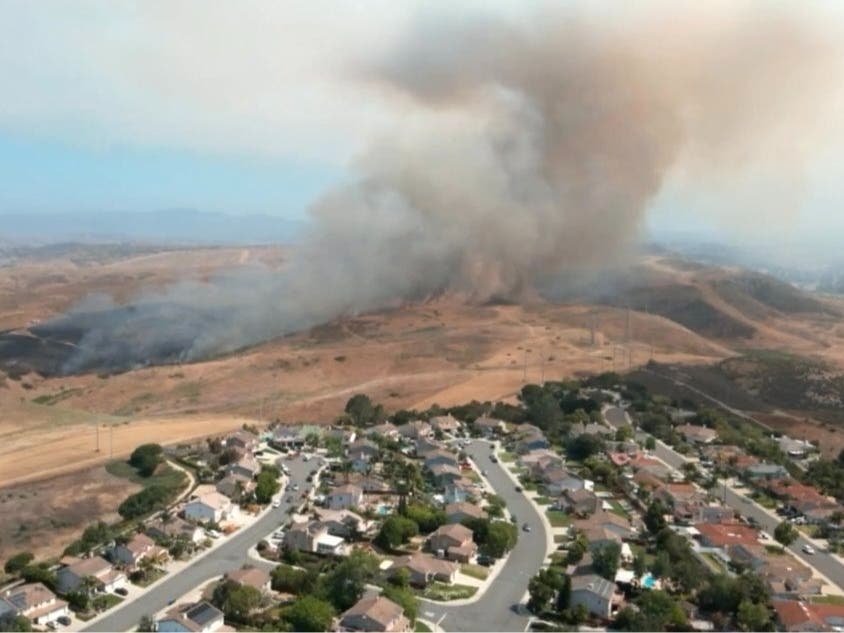 A fire burning near Oceanside is sending drift smoke through Southwest Riverside County.