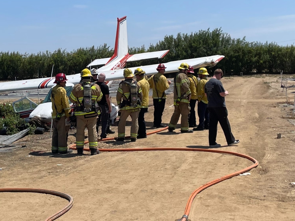 A small aircraft with two people inside crash-landed in a Riverside County field.