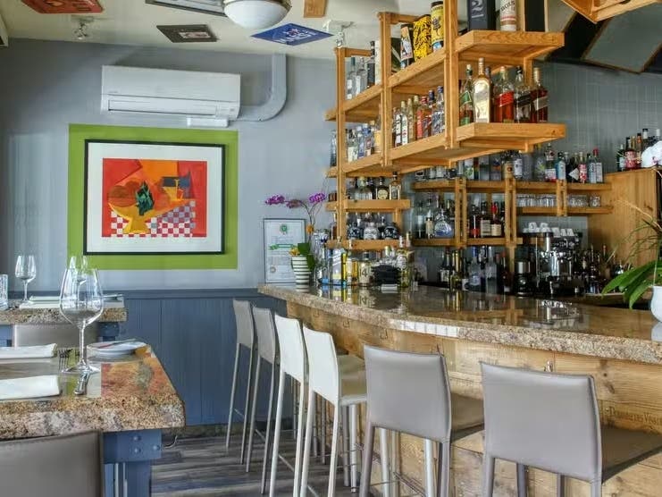 With many tables and a bountiful bar, the Johannes Restaurant is now serving up food five nights a week through summer's end.