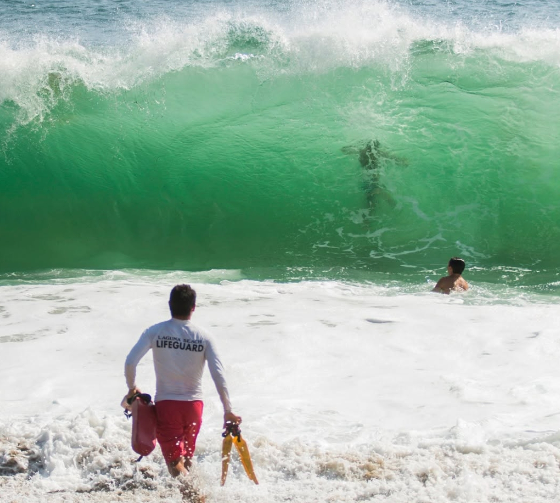 He grabbed the gear a neighbor kept near the shore to save a distressed swimmer caught in a rip current.