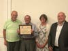 Honoring Gordon Thomson and William Lee (not pictured) with the YMCA Distinguished Leadership Award for their dedication to the Danvers Y and the community.