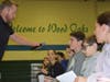Wood Oaks Junior High students talk to Navy SEAL Shane Anderson during the Veterans Day assembly.