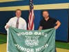 Wood Oaks Principal Dr. Rob McElligott, who served in the U.S. Navy, and Navy SEAL Shane Anderson took part in the junior high's Veterans Day assembly