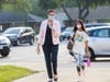 Dr. Mary Gorr, District 57's new superintendent, greets a Lincoln Middle School student on the first day of school, Aug. 18.