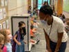 Westbrook first-grade teacher Mrs. Zei meets members of her new class.