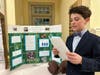 D. Trickett of North Reading explains how the P.S.I. of a football affects a player's catching rate.