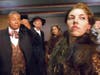 MISS NUTTING, PLEASE!: DARRYL MAXIMILIAN ROBINSON as The Chairman Mr. William Cartwright is appalled by SARAH MYERS as Miss Alice Nutting / Edwin Drood's behavior in "THE MYSTERY OF EDWIN DROOD."