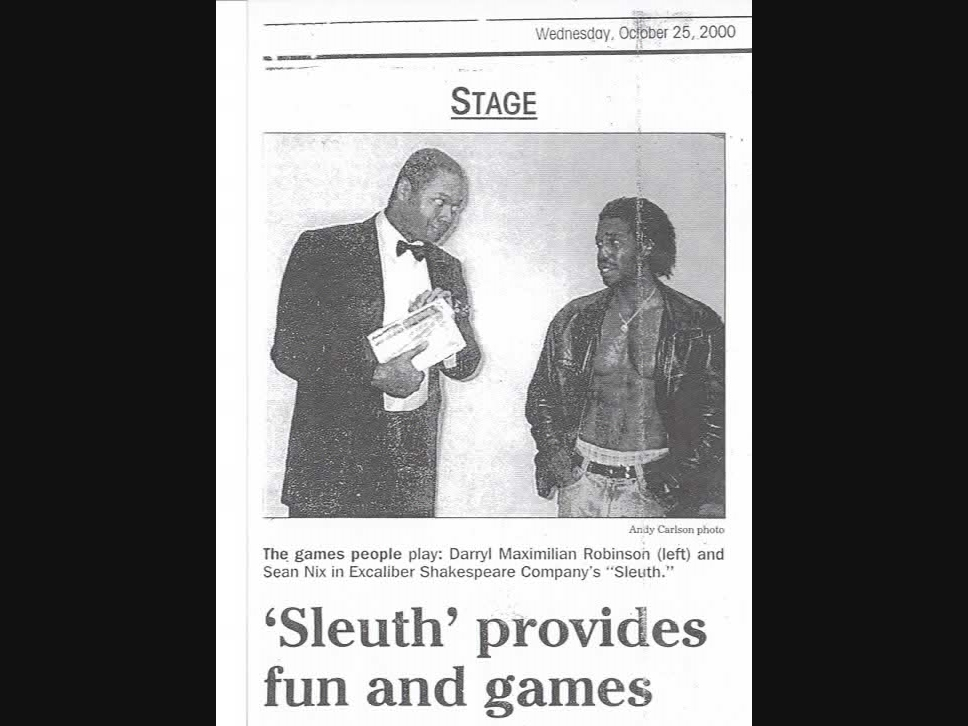 PLAYING CAT AND MOUSE: Excaliber Shakespeare Company of Chicago Founder and Artistic Director Darryl Maximilian Robinson directed and starred as Andrew Wyke opposite ESC Member Sean Nix as Milo Tindle in the first All-Black Cast of The Mystery "Sleuth".