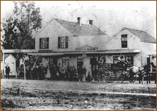 Gorman's Saloon and a harness shop, around 1875