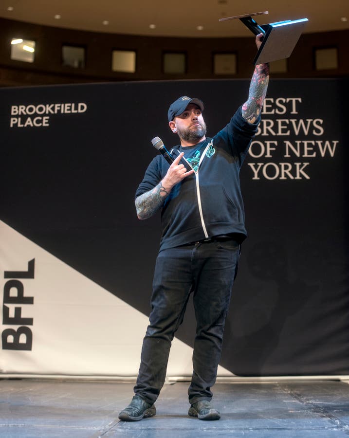Brian Winget of Barrier Brewing accepts the Best Brews in New York award.