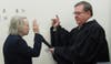 Village Justice Allen S. Mathers administered the oath of office to Mayor Theresa Trouvé.