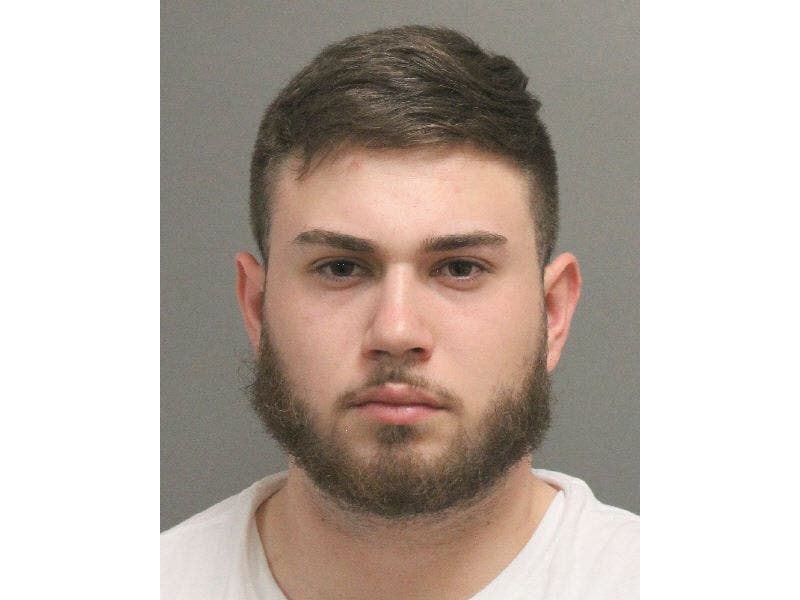 Police say Eric Dori injured three people, including a police officer, as he fled the scene of an attack in Farmingdale.