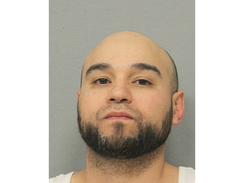 Police say Rafael Sanchez tried to scam a Nassau senior out of $7,000.