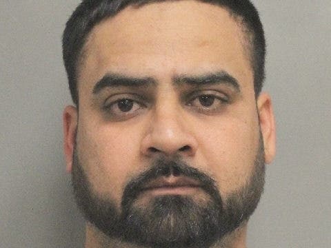Simarjit Singh was arrested after police say fireworks he was storing were used by a teen to start a fire.