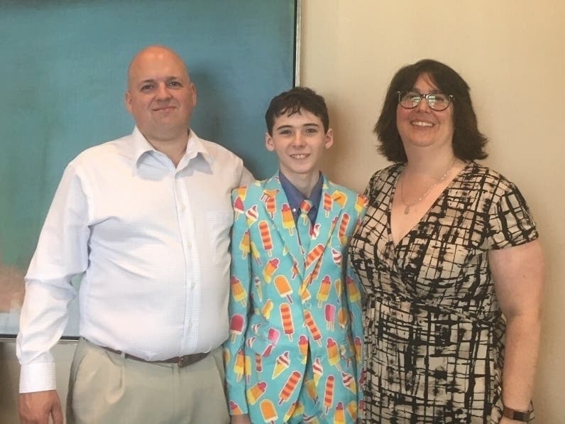 l-r: Mike D. (father), Michael D. and Keri D. (mother). 