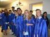 Wisdom Lane eighth graders at their moving up ceremony on June 17. 