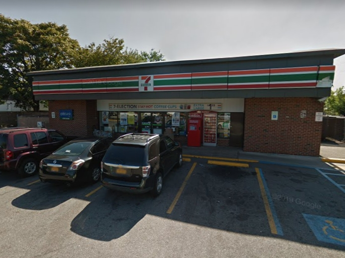 Two armed men robbed a 7-Eleven in Elmont early Friday, Nassau police said.