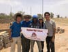 buildOn club members William McCormack (far left), Aiden McCormack (second from left), Ashley Johnson (second from right) and Avery Johnson (far right) traveled to Senegal, Africa to help build a school in the village of Keur Yorro.