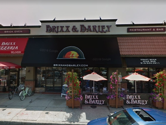 A woman is suing Brixx & Barley, claiming the Long Beach restaurant made her sick with salmonella and ruined her wedding.