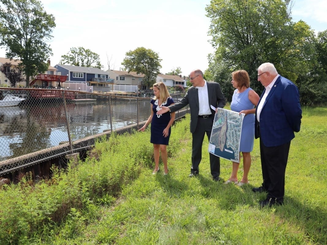 Supervisor Laura Gillen, left; Joseph Davenport, Town of Hempstead deputy chief of staff for infrastructure; Assemblywoman Judy Griffin; and Senator John Brooks.