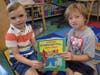 Martin Avenue kindergartners Axel Abbazio and Jackson Argyopoulos were ready to do some first day reading.