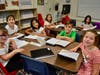 Second graders from Marion Street Elementary School jumped into a science lesson on the first day. 