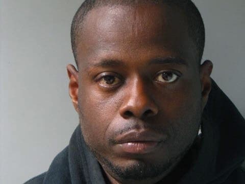 Police say Jamali Johnson was looking into the stalls in a women's restroom.