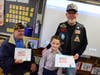 First grader Joseph Mulligan had the pleasure of welcoming both of his grandfathers to school, Joseph Mulligan, left, and Thomas Marr.