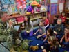 Rich Symington, a current member of the Navy, recounted his experiences to third graders.