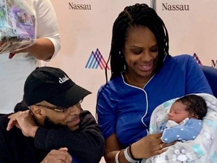 Proud parents Bernard Nichols and Tami Hall with their newborn, Bernard Casey Hall Nichols.