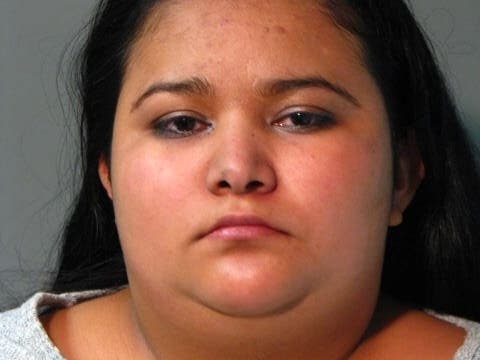 Police say Yenci Elizabeth Lopez put a 2-year-old in a scalding hot bath, burning about 20 percent of his body.