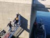 Firefighters entered the structure of the bridge to rescue the worker, who fell 16 feet to the base of the bridge support.