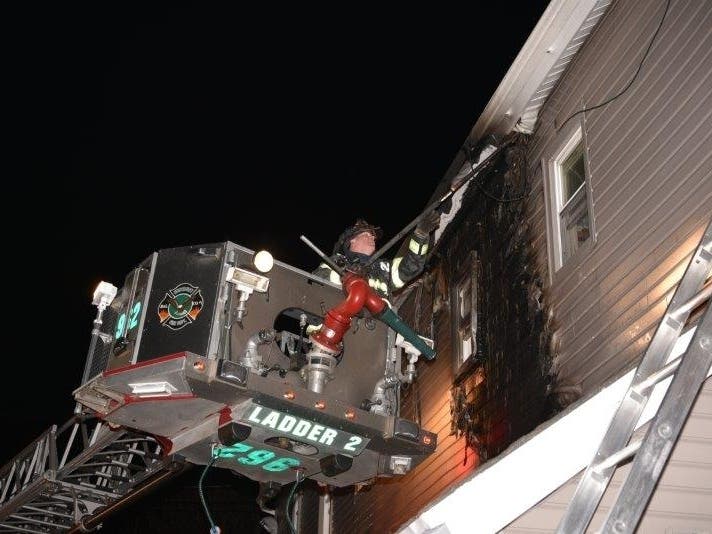 Firefighters quickly brought a fire on the exterior of a New Cassel apartment under control Sunday night.