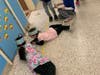 Using clipboards and their English language arts skills, Charles A. Reinhard Early Childhood Center students hunted for 100 site words around the hallways on the 100th Day of School.