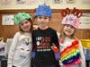 McKenna Elementary School kindergartners, from left, Madison Ufier, Christopher Brooks and Caragh McNamara wore special shirts for the 100th day of school.
