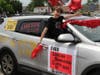 “The best is yet to come” according to the messaging on the festively decorated car carrying Levy Lakeside School sixth grade grad Evan, who is all smiles.