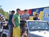 As seniors drove through the parking lot, they looked for family and friends. 