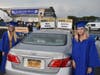 Twins Nina Gonsor and Juliette Gonsor awaited the start of the ceremony, held in the TOBAY Beach parking lot. 