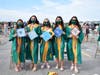 Graduates Alexandra Sylvia, left, Maria Russotti, Jane Hoeflinger, Caitlin McElwee-Buchala and Camden Hetrick with their decorated caps. 