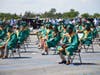 Lynbrook High School graduates wore masks and stayed six feet apart during their senior celebration on July 23. 