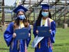 Marabelle Delaurentis, left, and Priyanka Amin, two members of the East Meadow High School Class of 2020, proudly displayed their diplomas following their graduation ceremony on July 26. 