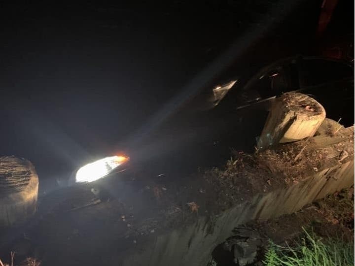The Long Beach Fire Department helped three people after the car they were in drove off a bulkhead and into Reynolds Channel Sunday night.