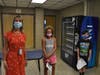 New executive assistant to the principal Keri Wing greeted some of the new sixth graders as they followed health and safety protocols during a tour of Berner Middle School. 